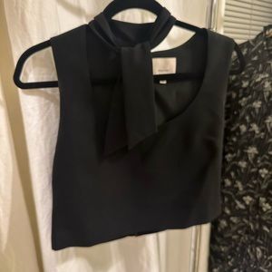 Cute black Cinq a Sept top with tie neck.